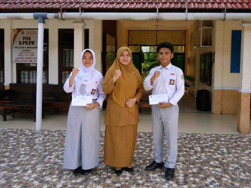 Semangat Juang Berbuah Prestasi: Rahma Aqila dan Akmaludin Persembahkan Medali Perunggu O2SN Pencak Silat, SMAN 2 Puding Besar Berikan Apresiasi